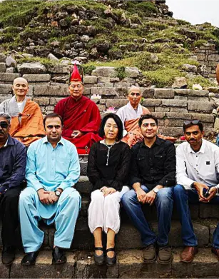 Buddhist Religious Tourism – group at Bhamala Statue in KP
