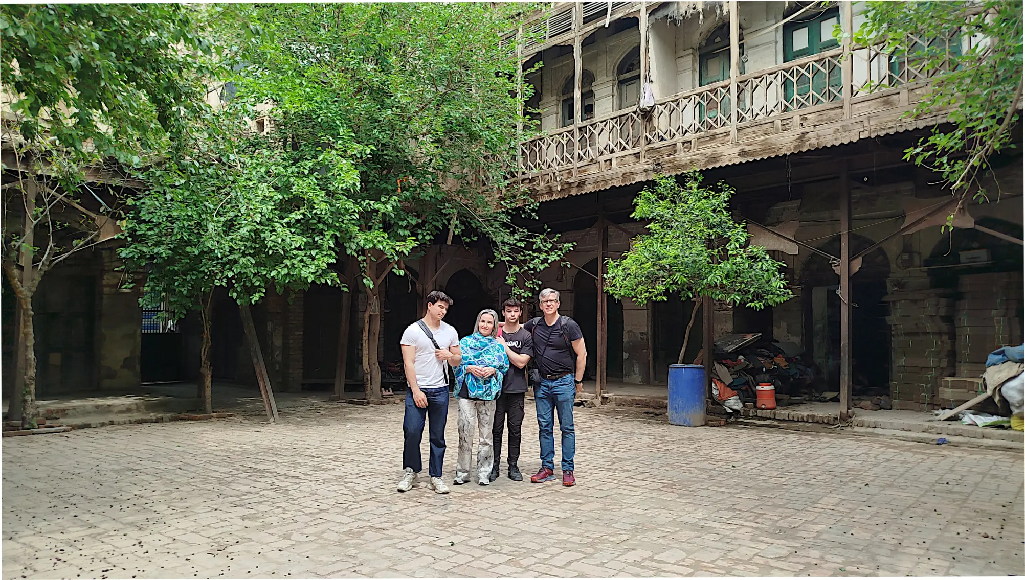 European tourists group inside an old caravanserai in the Walled City of Peshawar
