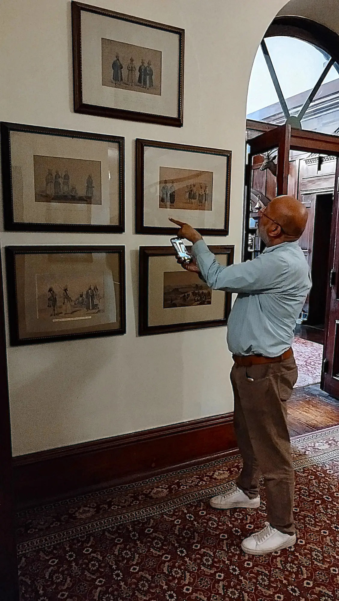 Farrukh Husain author of book on Afghanistan examines Rattray’s Afghan paintings in the Governor’s House KP